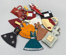 Load image into Gallery viewer, Black leather and pearl daisies little dress bag charm