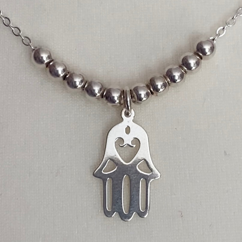 Hamsa hand silver necklace