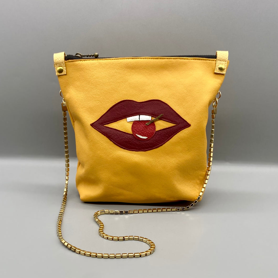 Yellow leather lip cherry bag