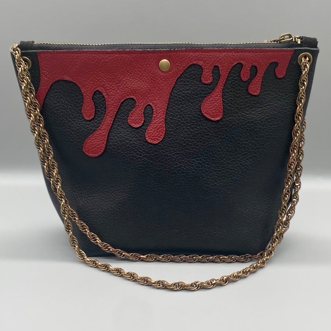 Black leather drip bag