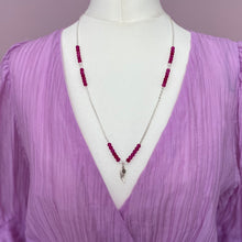 Load image into Gallery viewer, Dark pink frosted bead and sterling silver angel wing necklace
