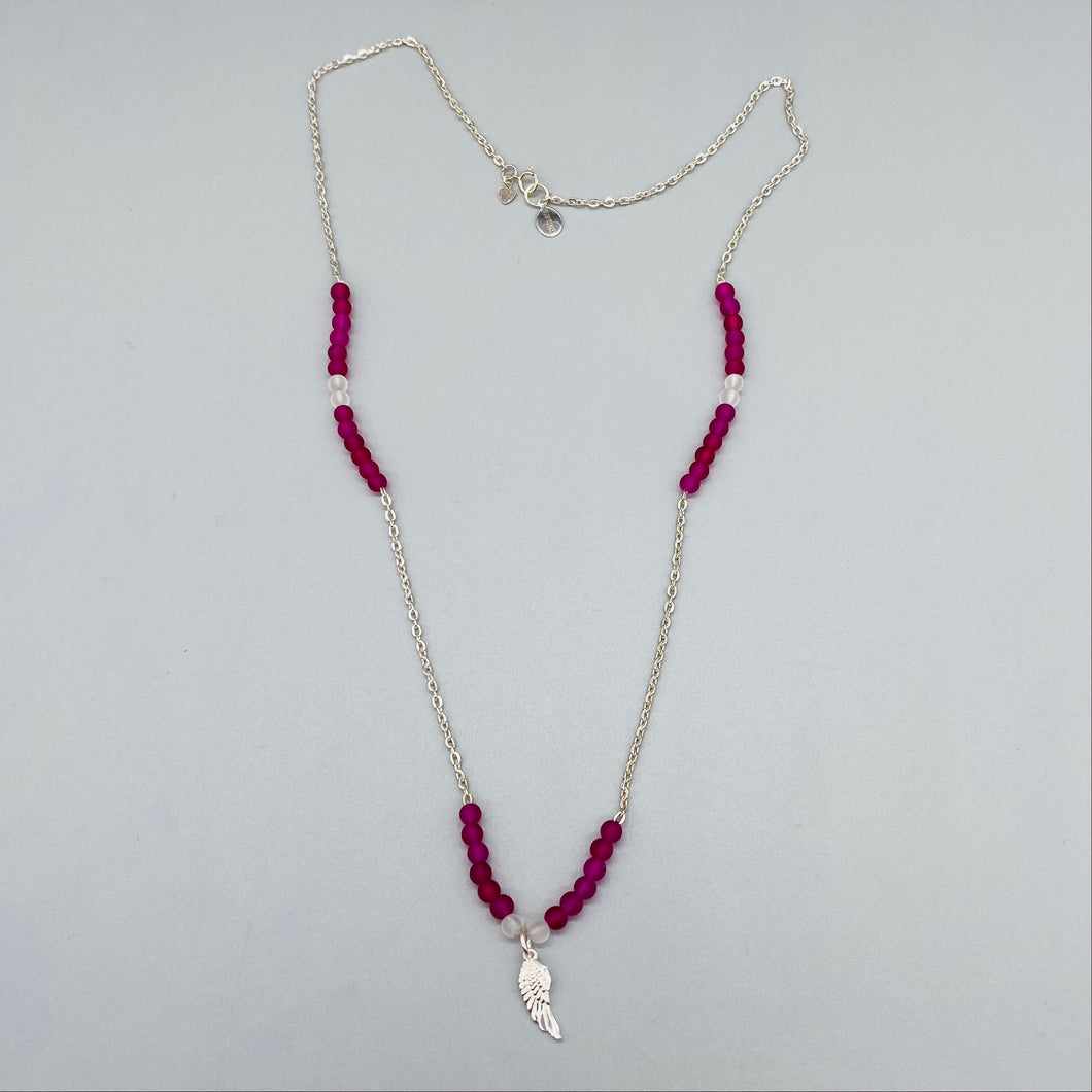 Dark pink frosted bead and sterling silver angel wing necklace