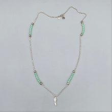 Load image into Gallery viewer, Pale green frosted bead and sterling silver angel wing necklace
