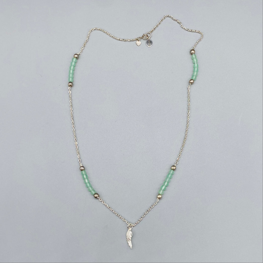 Pale green frosted bead and sterling silver angel wing necklace